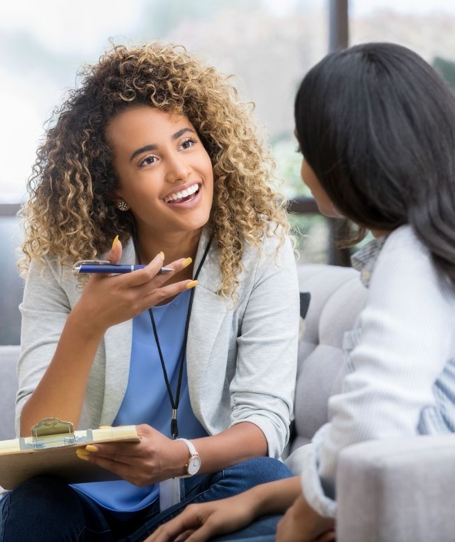 Therapist talking to client